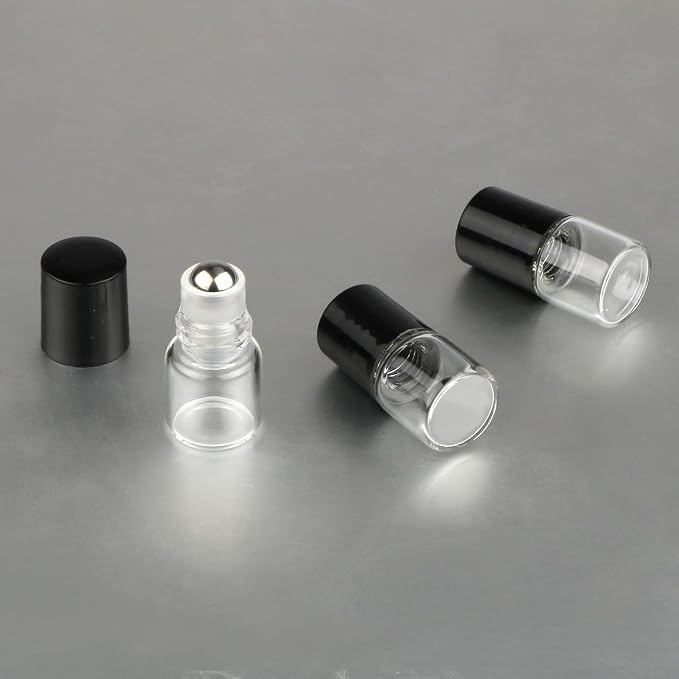 Wresty 25 Pcs Clear Glass Mini Roll On Bottles Empty Essential Oil Roller Ball Bottles Perfume Lip Blam Cosmetic Sample Vials Roller Glass Bottles Container With Black Cap (1ml)