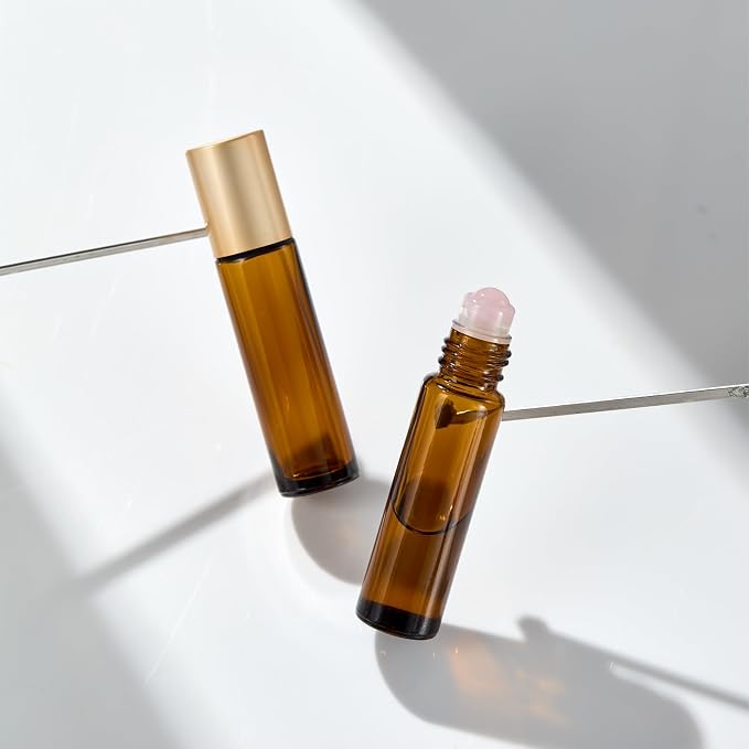 Qeuly 6 Pack Rose Quartz Roller Bottles for Essential Oils, 10ml Amber Glass Roll on Bottles with Natural Crystal Balls, Leak-Proof Travel Size Perfume Roller Bottle (Amber)