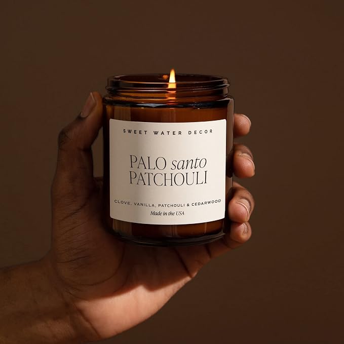 Sweet Water Decor Palo Santo Patchouli Soy Candle - Black Pepper, Clove Leaf, Nutmeg and Lavender Scented Candles for Home - 9oz Amber Jar + Black Lid, 40+ Hour Burn Time, Made in the USA
