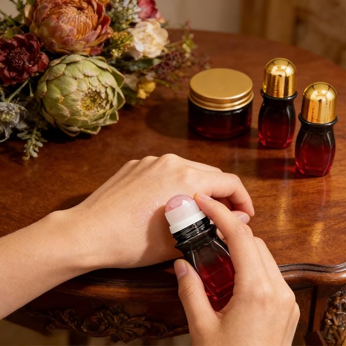 Rose Quartz Roller Waisted Bottles for Essential Oils,30ml Refillable Amber Glass Roll On Bottles with Natural Crystal Roller Balls, Leak-Proof Travel Perfume Bottle with Gold Caps