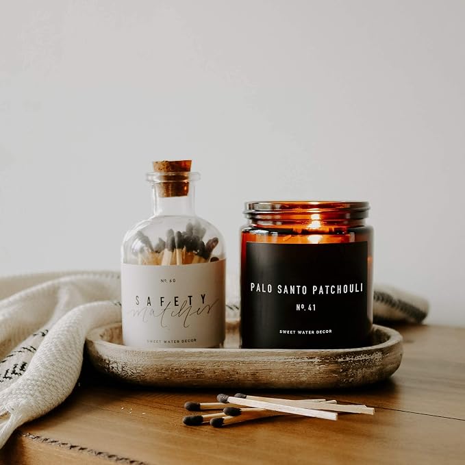 Sweet Water Decor Palo Santo Patchouli Candle - Vanilla, Musk, Sandalwood, Patchouli Scented Soy Spa Candles for Home - Gifts for Women, Men - 9oz Amber Jar, 40 Hour Burn Time