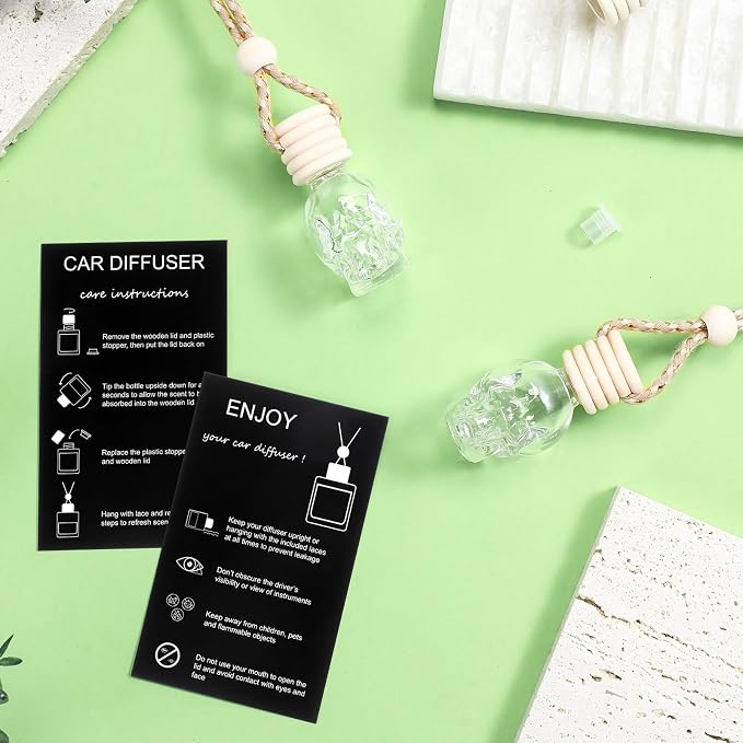 Boao 50 Sets Halloween Skull Hanging Car Air Freshener Diffuser Bottles with 2 x 3.54 Inch Car Diffuser Instructions Cards for Empty Essential Oil Bottles(Black Card,Skull)