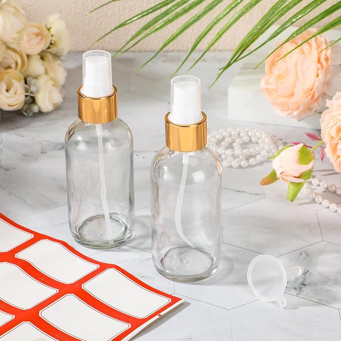 Fumete 2 Pack Glass Bottles 4oz Empty Refillable Liquid Containers with 1 Label 1 Funnel for Essential Oils Hair Travel Plants Cleaning Skin Care(Clear, Golden Top,Mist Bottle)