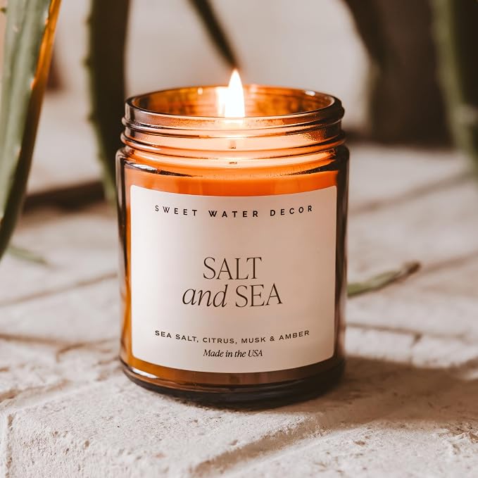 Sweet Water Decor Salt and Sea Soy Candle - Sea Salt, Citrus, Musk, and Amber Scented Beach Candle for Home - 9oz Amber Jar + Black Lid, 40+ Hour Burn Time, Made in the USA