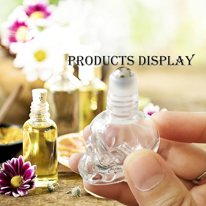 7 pcs Set 10ml Mini Skull Glass Oil Roller Bottles Leakproof Essential Oils Bottle for Storage and Travel (transparent)
