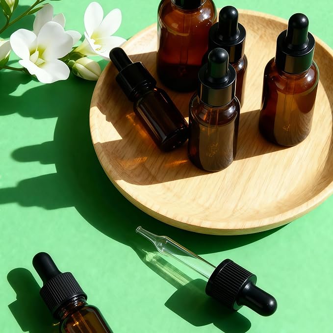 erioctry 5ML/10ML Amber Glass Essential Oil Bottles and Eyed Dropper Black Caps Makeup Cosmetic Sample Container Boxes of Glass for Essential Oil Aromatherapy Use(Pack of 12) (10ML)