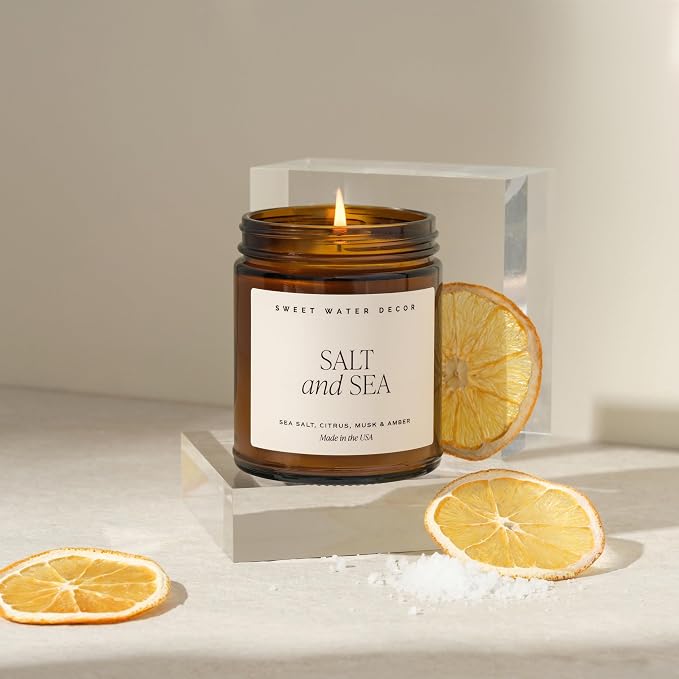 Sweet Water Decor Salt and Sea Soy Candle - Sea Salt, Citrus, Musk, and Amber Scented Beach Candle for Home - 9oz Amber Jar + Black Lid, 40+ Hour Burn Time, Made in the USA