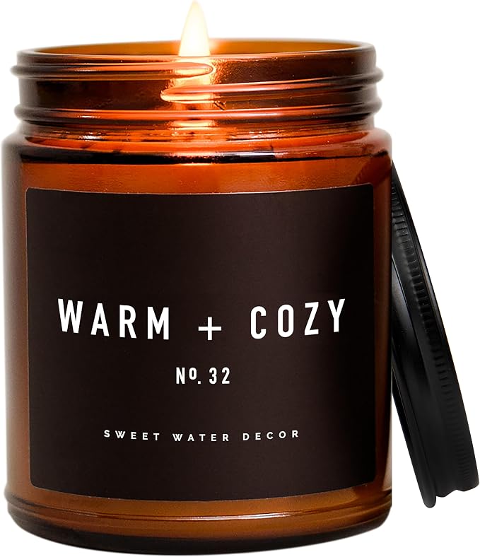 Sweet Water Decor Warm and Cozy Candle | Pine, Orange, Cinnamon, and Fir Balsam Winter Scented Soy Candles for Home | 9oz Amber Jar with Black Lid, 40 Hour Burn Time, Made in the USA