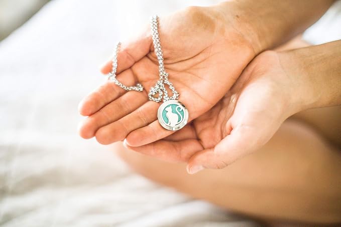 Wild Essentials Pretty Kitty Cat Essential Oil Diffuser Necklace, Stainless Steel Locket Pendant with 24 inch Chain, 12 Color Refill Pads, Customizable Color Changing Perfume Jewelry for Aromatherapy