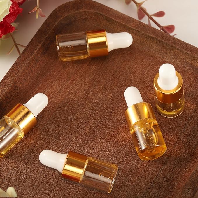 100 Pcs Sample Dropper Bottles,1ml Clear Glass Dropper Bottles,Clear Essential Small Empty Bottle for Cosmetic Liquid Perfume,Empty Travel Sample Vials with Gold Cap(1 ml,Gold)