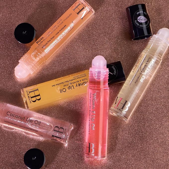EXPRESSIONS 7pc Lip Oil Collection - Nourishing High Shine Lip Glow with Essential Oils, Hydrating Roll On Lip Oils Infused w/Essential Oils - Rollerball Lip Oils, Vitamin Enriched Lip Oil Set